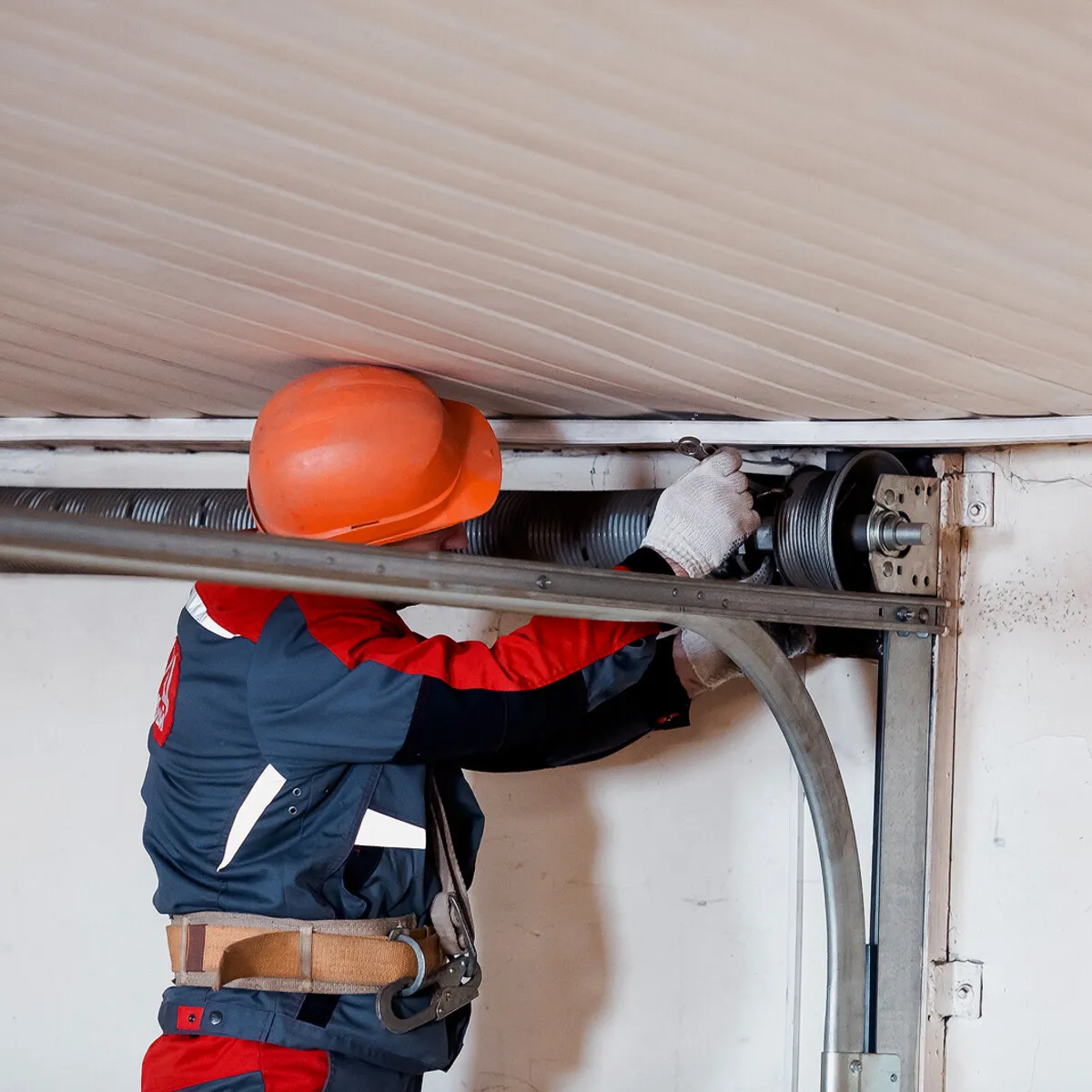 garage door cable repair Las Vegas technician replacing cable