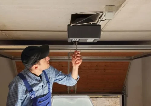 garage door opener repair Las Vegas technician fixing opener motor