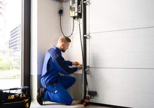 1️⃣ garage door maintenance Las Vegas NV technician inspecting door system