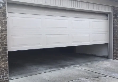 garage door replacement Las Vegas technician installing new garage door